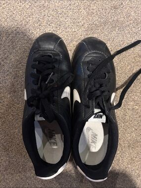 Nike Women’s Black Sneakers with White Swoosh